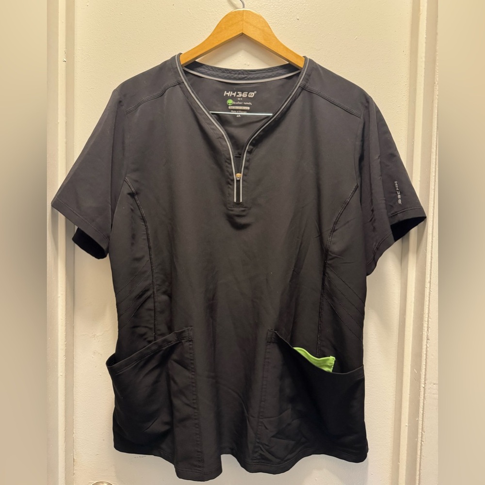 Black scrub top size 2X. Zipper neck. GUC.